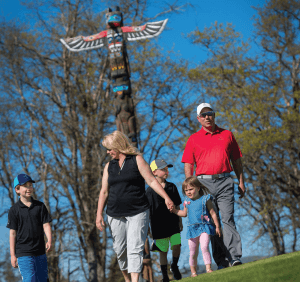 Bob & Chana Hyer with their grandchildren at Robert Trent Jones Jr.’s Totem Pole at Eagle Point Golf Club. - Photo by <a href=